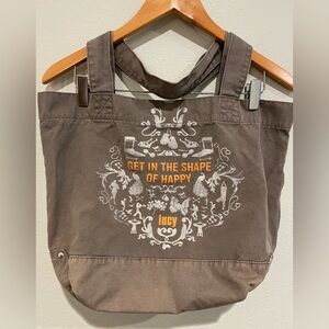 Lucy canvas bag with cup holder inside.  Olive brown with orange accents.